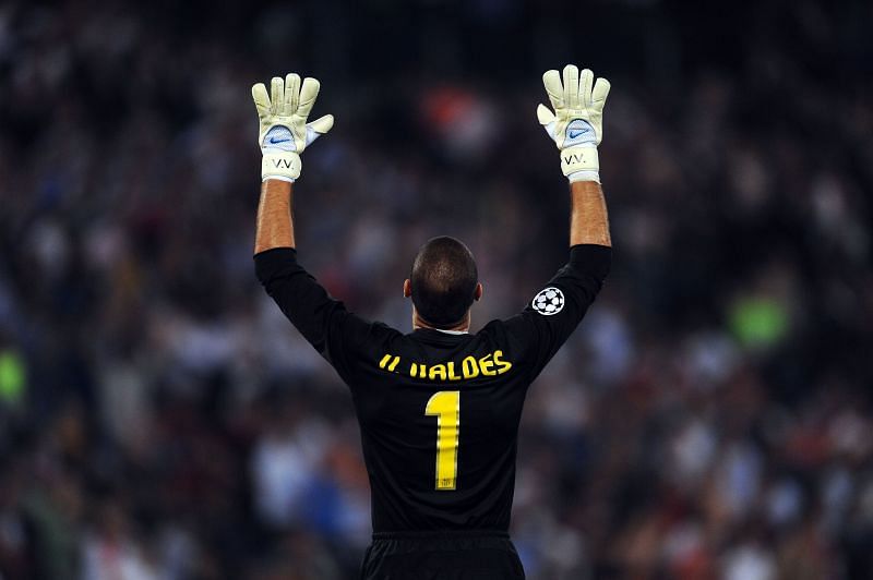 Victor Valdes celebrates a goal for Barcelona